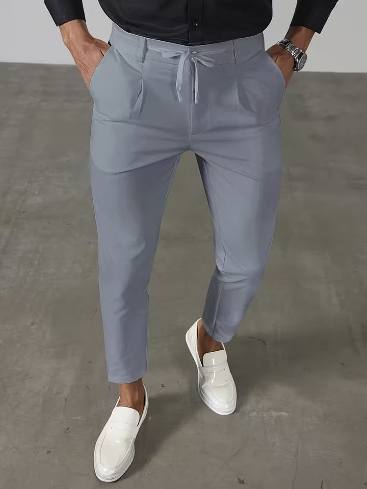 PLEATED TAPERED ANKLE TROUSERS FOR MEN