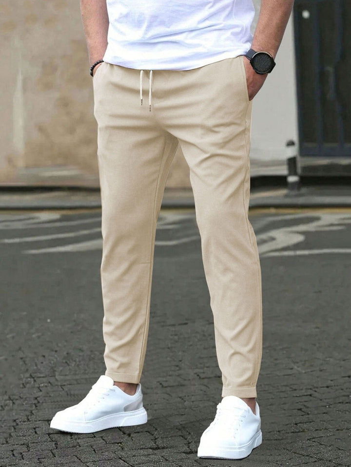 STRETCH TAPERED TROUSERS FOR MEN